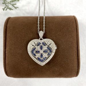 Sapphire heart locket